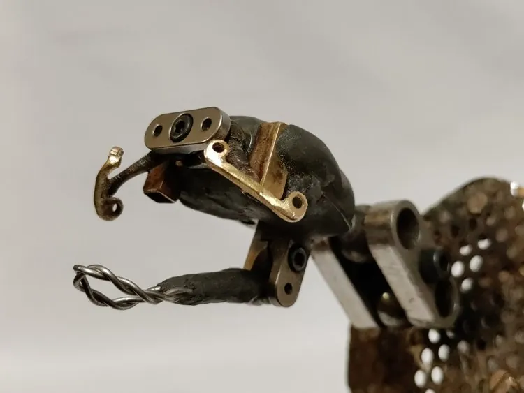 Exposed metal jaw and skull armature inside the walrus puppet