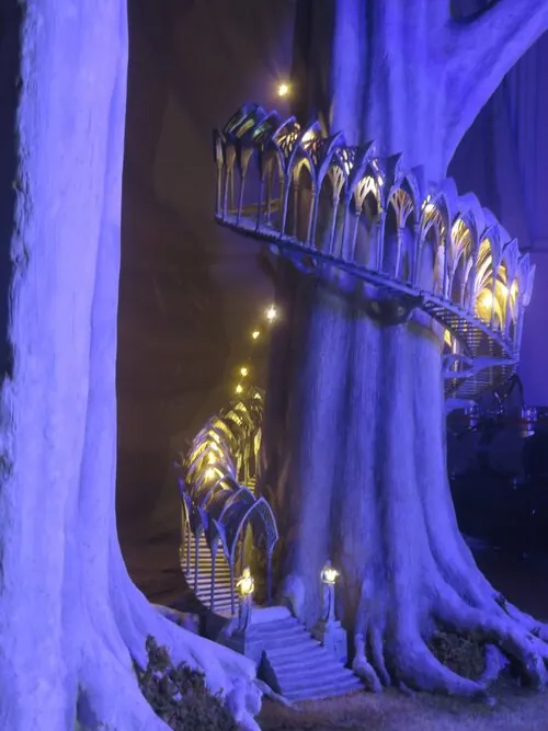 Illuminated Lothlorien staircase winding around the model tree