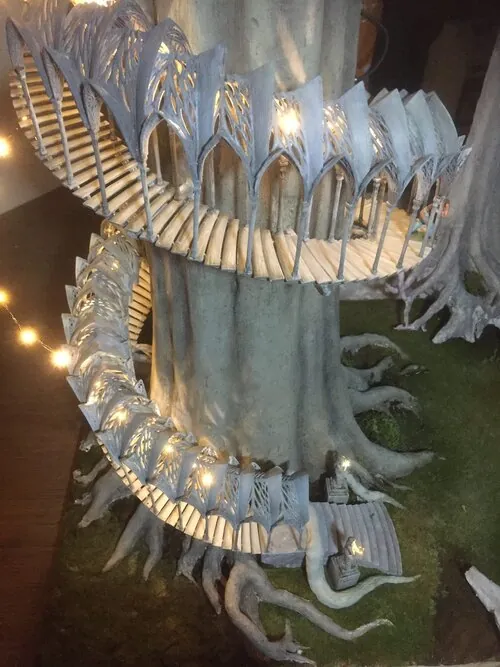Close view of the illuminated staircase and railings