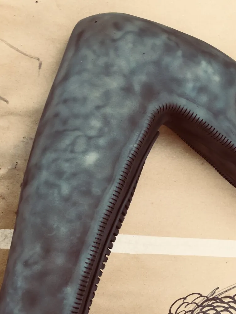 Close view of the painted Xenomorph arm surface