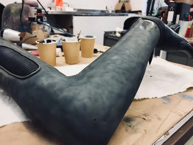 Xenomorph arm prop on the workshop bench