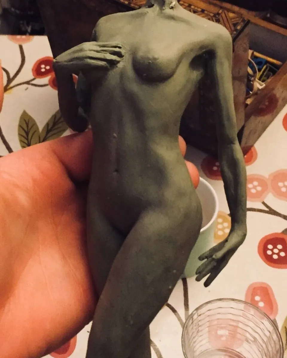 Front view of a figure sculpture during modelling