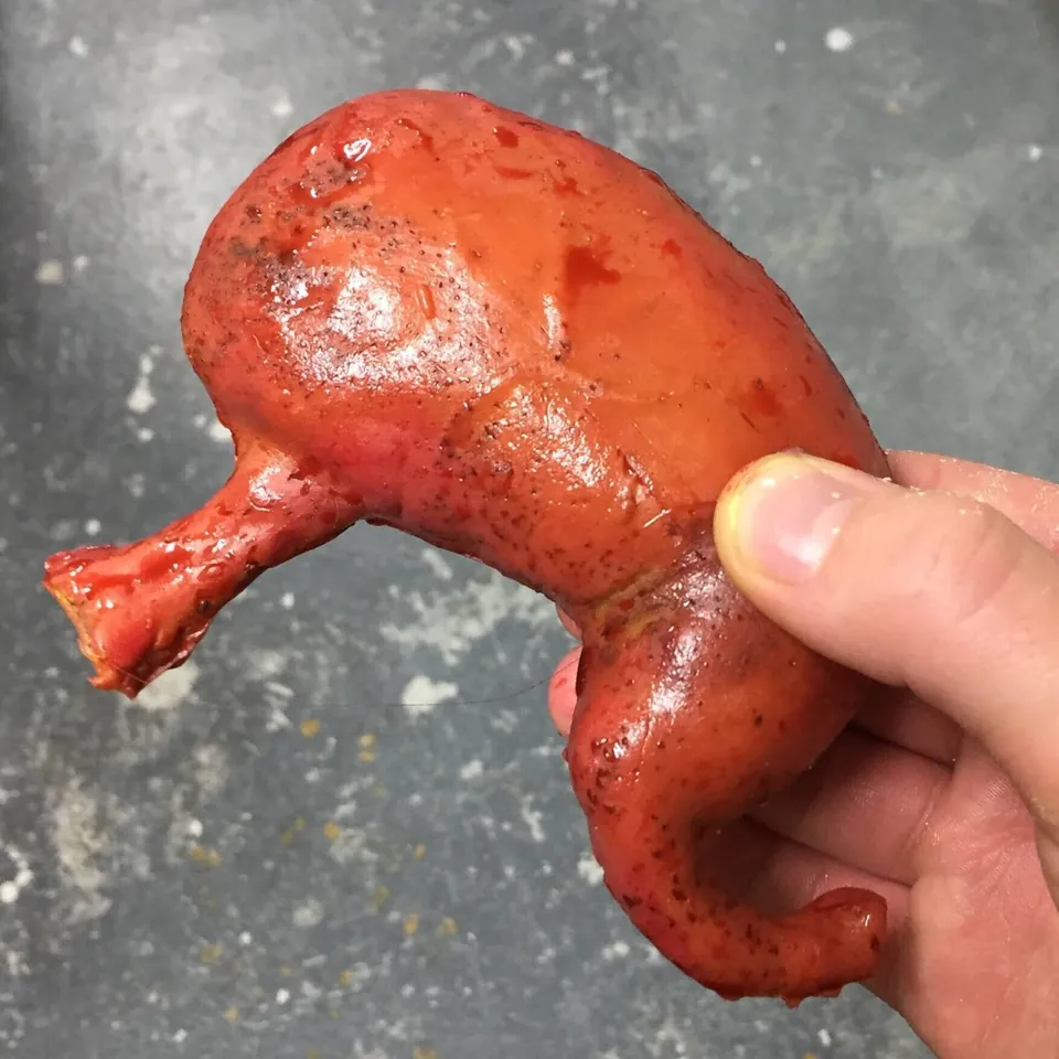 Red creature head during fabrication