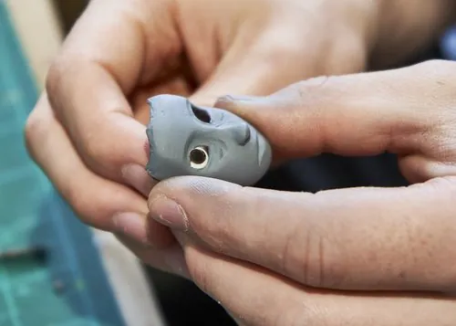 Fitting an eye into a puppet head