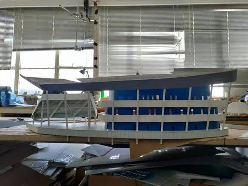 Completed stadium facade with roof supports