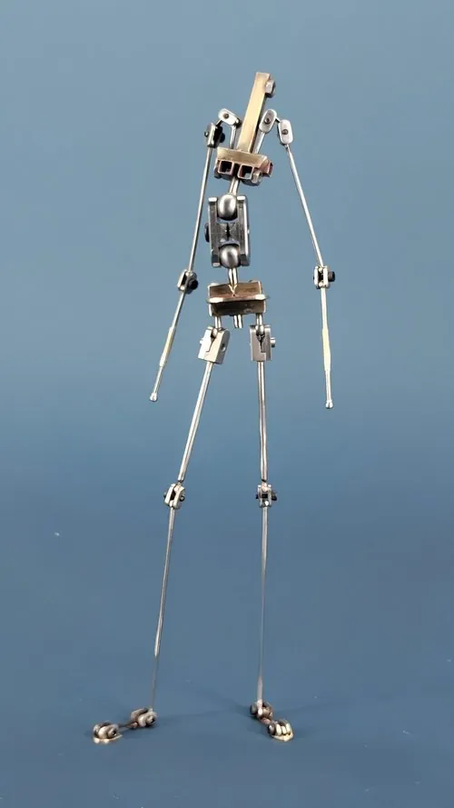 Metal puppet armature with articulated limbs