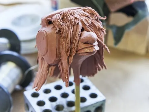 Sculpted character head with detailed hair