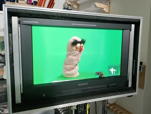 Animation preview displayed on a studio monitor