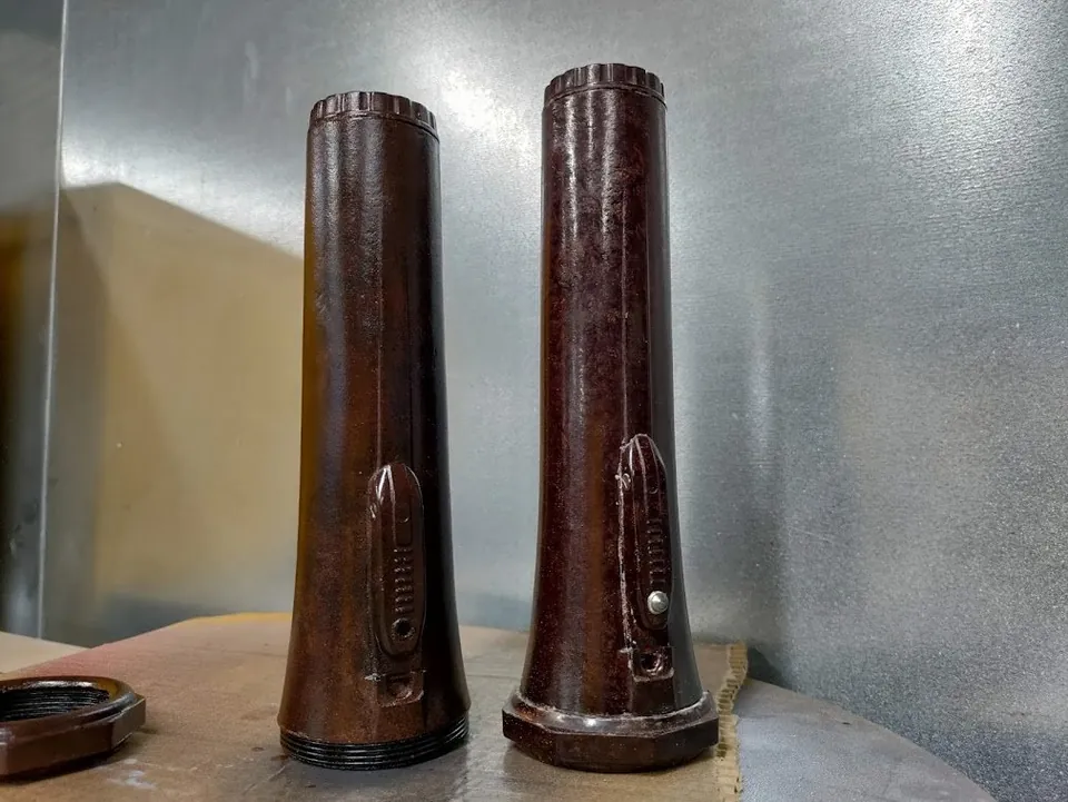 Two finished textured prop components