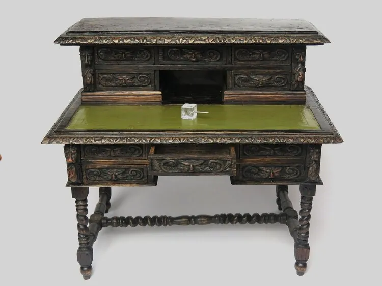 Front view of the miniature writing desk with green writing surface