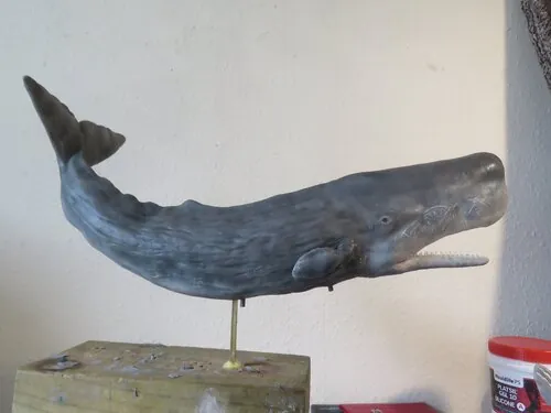 Full side view of the whale puppet and flippers